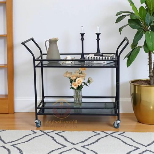 عربه تقديم بلون اسود واسطح زجاج بتصميم انيق وعصري