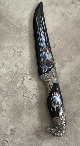 خنجر - برأس حيوان