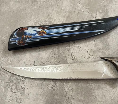 خنجر - برأس حيوان