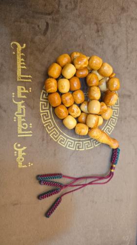 Amber-colored clay prayer beads 47g