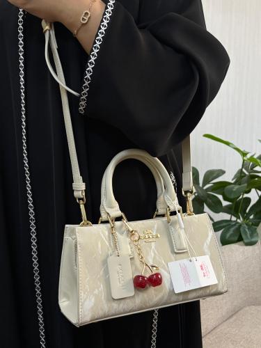 شنطة كوتش (COACH)