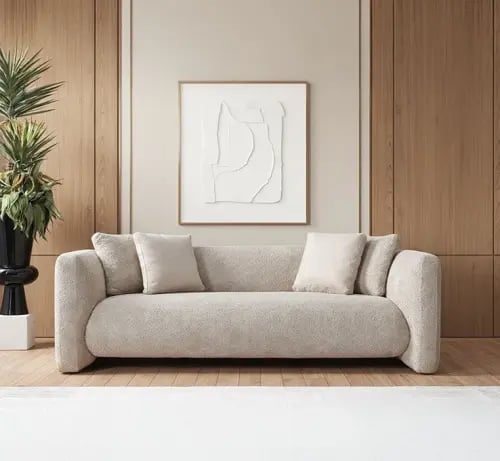 Three-seater beige sofa