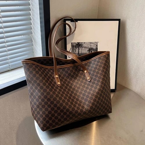 حقيبة يد من الجلد الصناعي