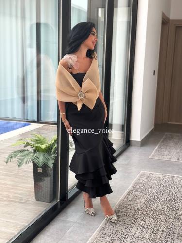 فستان اسود قماش باربي مع قطعه علوية باللون البيج