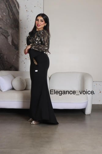 فستان اسود من قماش الباربي والترتر التايغر