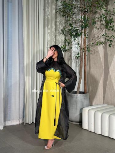 فستان اصفر مع قطعه اسود