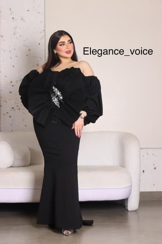 فستان اسود من قماش السيبال