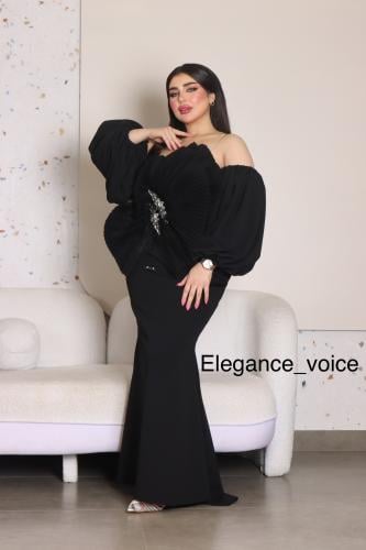 فستان اسود من قماش السيبال