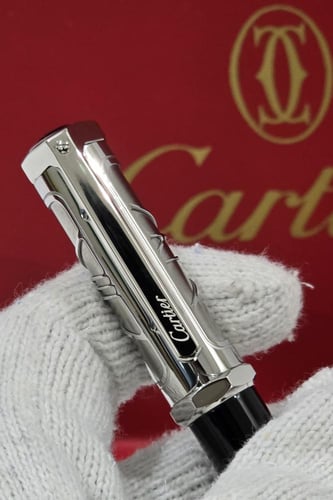 قلم كارتير سانتوس فرار