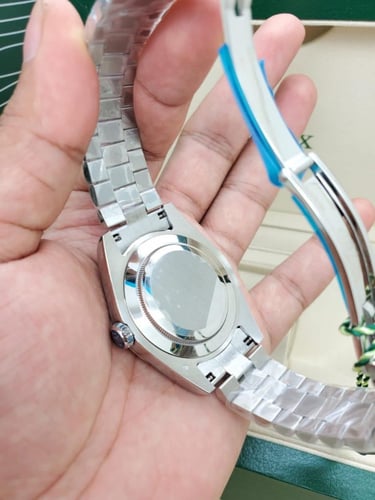 ساعة رولكس عربية