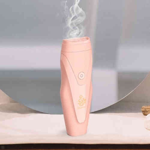 مبخرة الكترونية مزودة بمشط لتبخير الشعر