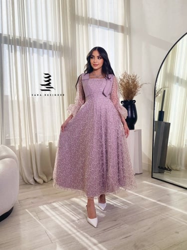 فستان وردي بتطريز كامل