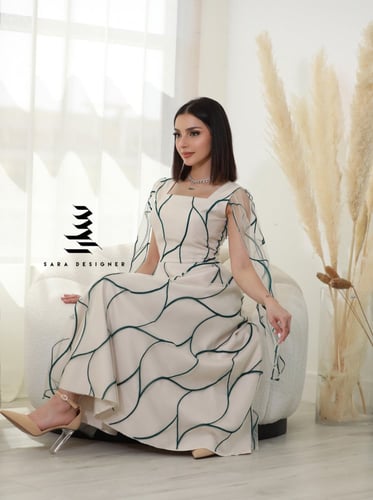 فستان بيج بتطريز اخضر