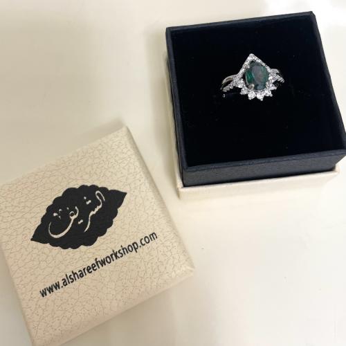 خاتم فضة نسائي بحجر توباز اخضر مرصع زركون سويسري
