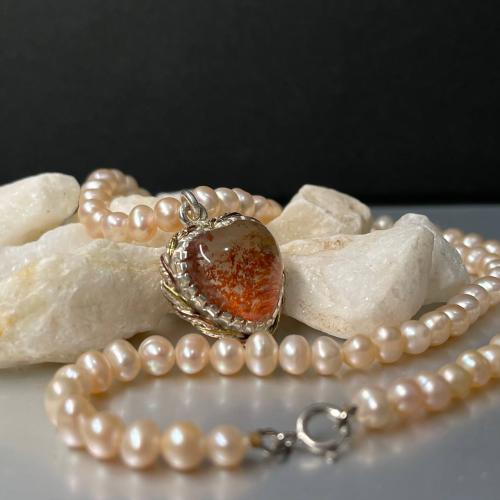 عقد لؤلؤ بحجر در نهري طبيعي