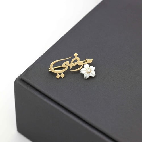 بروش أسمك من ذهب مع وردة الجوري