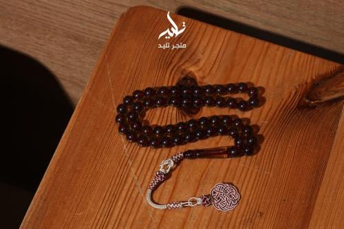 مسباح بكلايت عسلي بني شفاف