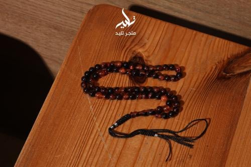 مسباح بكلايت أسود/برتقالي مموج