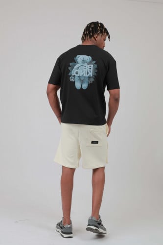 تيشيرت اوفر سايز أسود بطبعة “BE KIND”