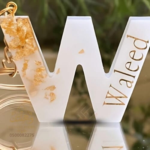 ميدالية مفتاح بحرف إنجليزي حسب الاختيار