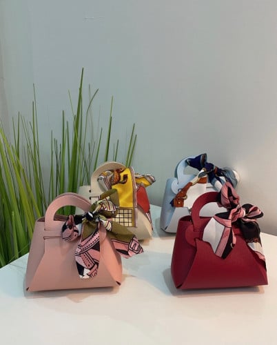 توزيعات شنط جلد انيقة