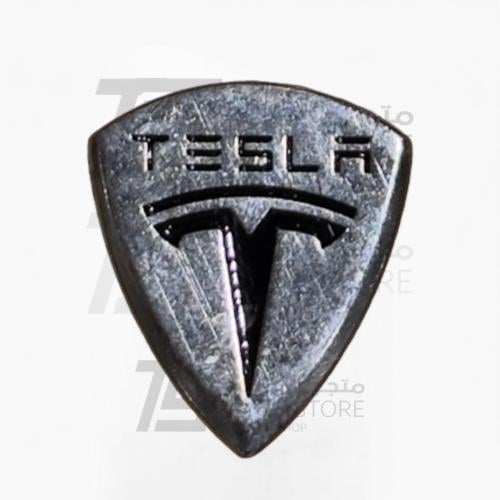 استكر معدني - شعار تسلاء