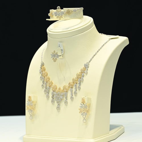 طقم ذهب ابيض واصفر لازوردي دمعة الثلج