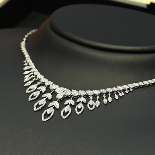 طقم ذهب غصون ابيض