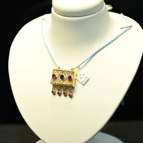 تعليقة ذهب بيت القران