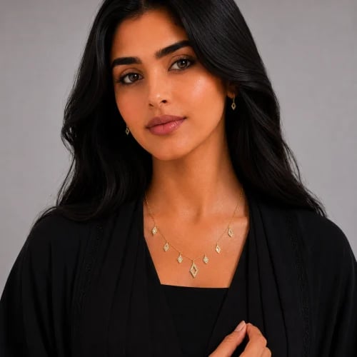 Gold bracelet with 7 charms