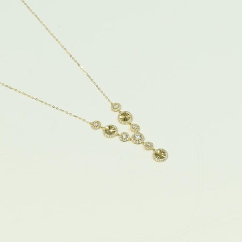 طقم ذهب دوائر مرصع بالزركون