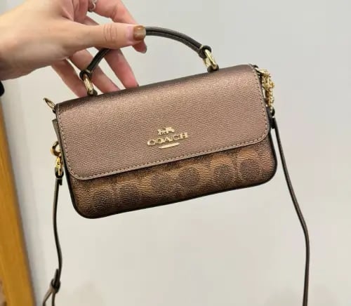 شنطة كوتش coach