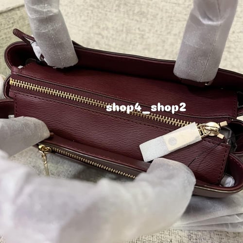 شنطة دكني عنابي DKNY