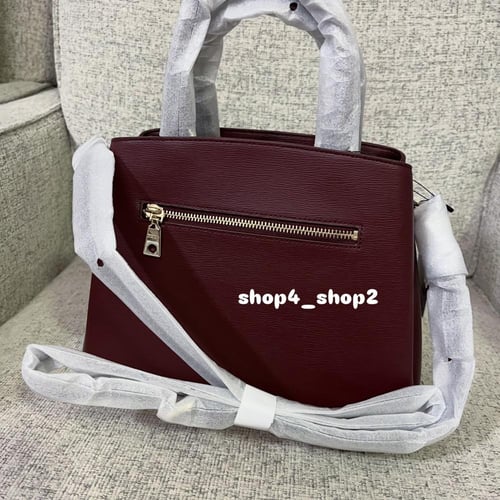 شنطة دكني عنابي DKNY