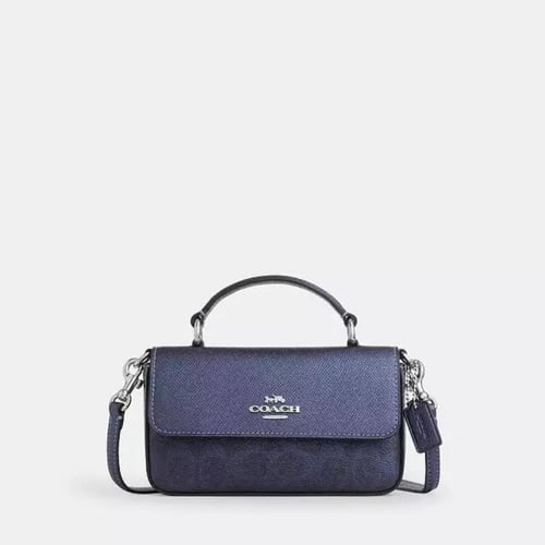 شنطة كوتش coach