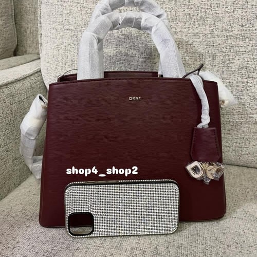 شنطة دكني عنابي DKNY