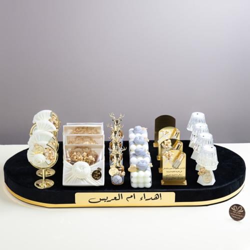 بكج توزيعات 24 قطعة + هدية ستاند خشبي