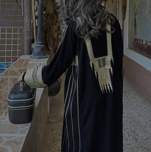 جلابية القط العسيري الذهبي