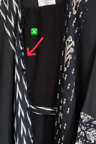 عباية باللون الأسود والأبيض بالنقوش الهندية