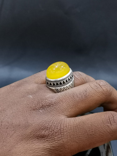 خاتم الفضة بحجر خرساني ايراني أصفر بصياغة الخفاش ا...