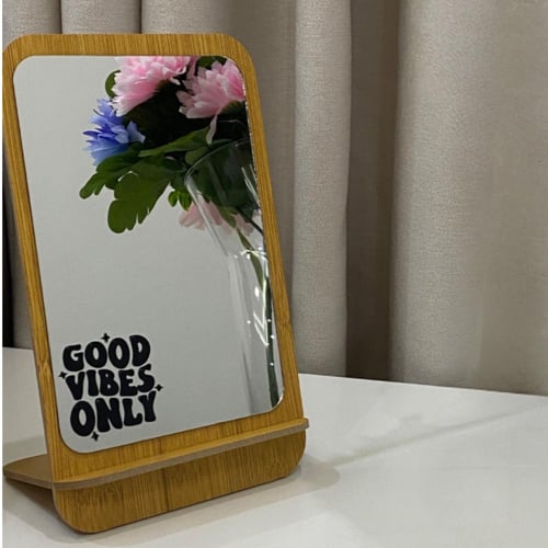 مرايا مور خشبية