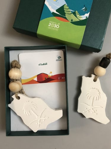 تعليقة سيارة - شعار المملكة