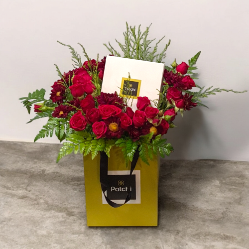 Pastry chocolates with red roses for Valentine's D...