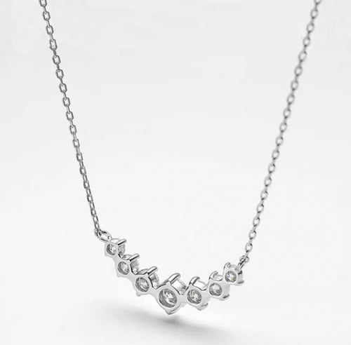 عقد 7 الماسات مويسانيتي 2.8قيراط