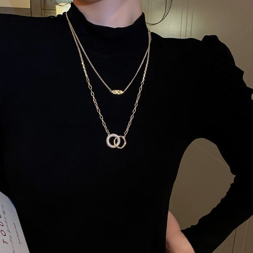 عقد مزدوج بدبلتين موديل كوبي 18K