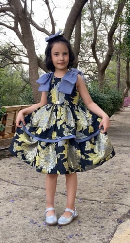 فستان أطفال من التفته المشجر بتصميم أنيق
