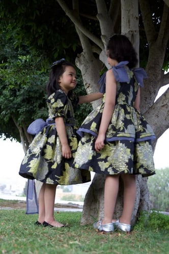 فستان أطفال من التفته المشجر بتصميم أنيق