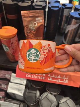 All orange ceramic cup