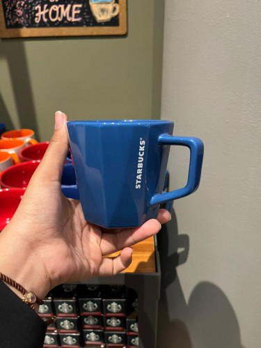 glossy blue cup