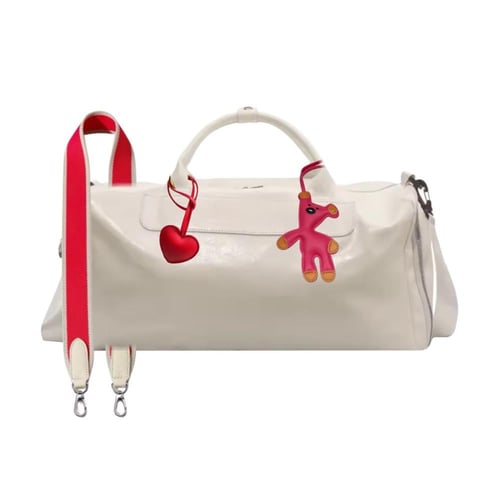 TRAVEL BAG + STRAP + CHARMS